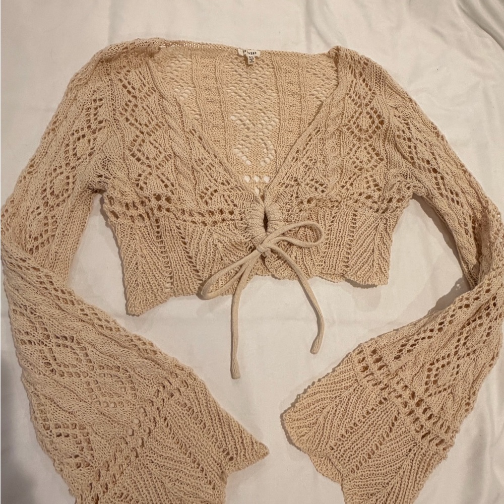 Cream Crochet Tie-Front Top with White Denim Cutoffs